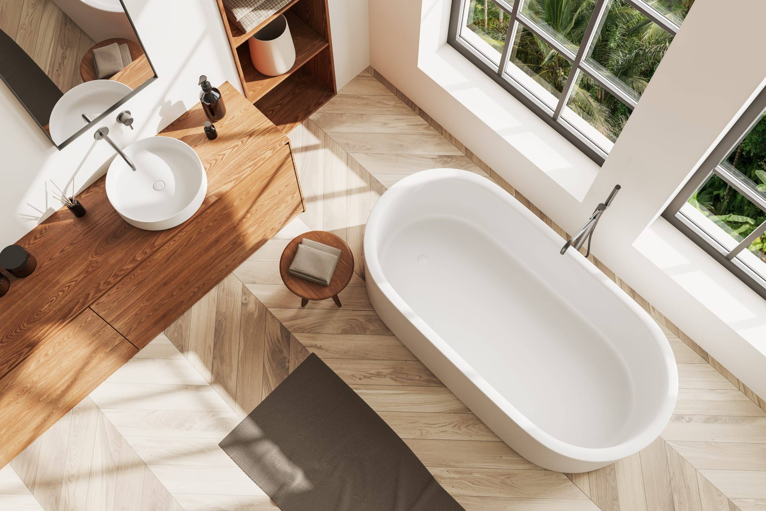 Top view of wooden bathroom with bathtub and sink with mirror